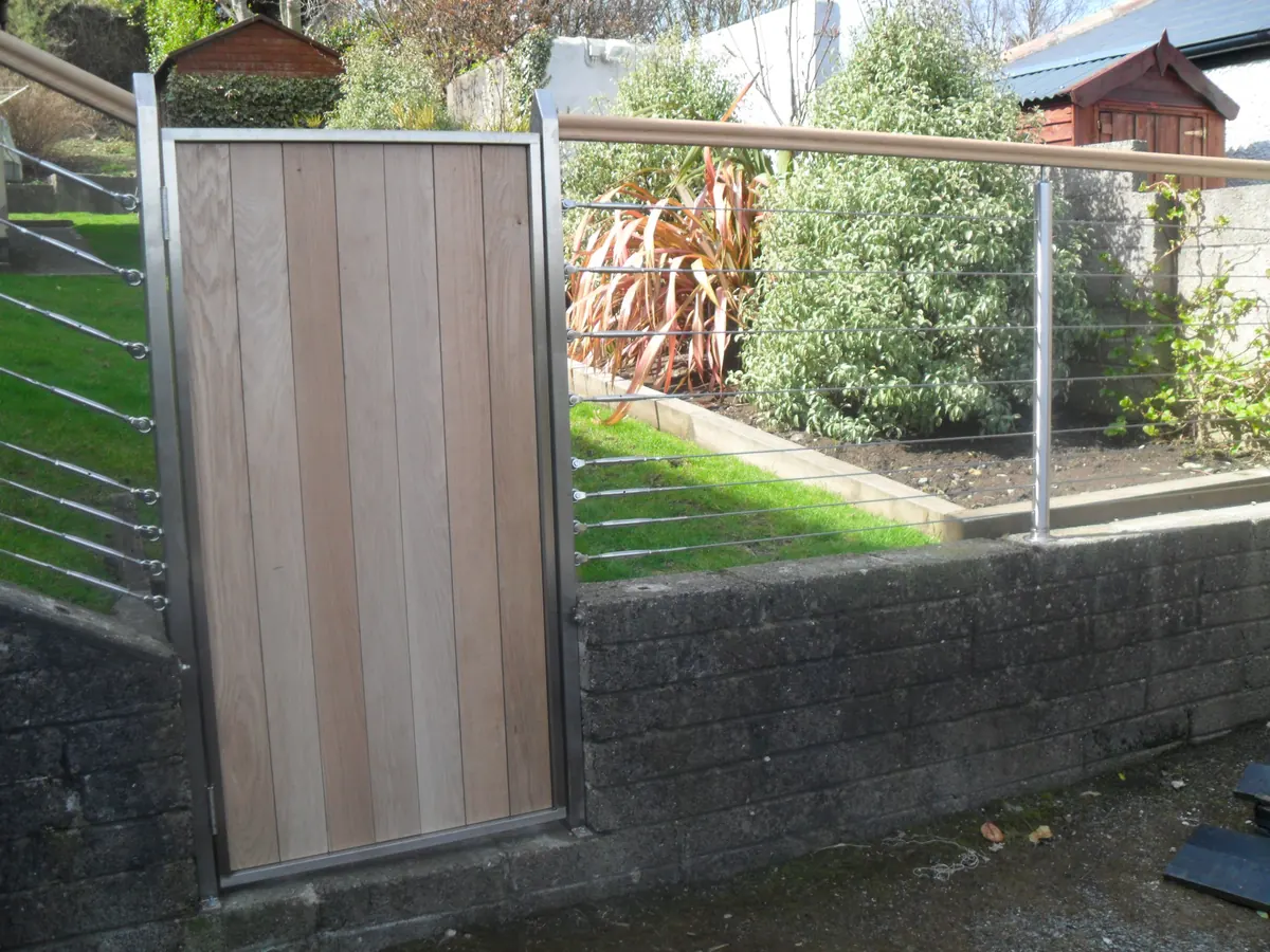 Timber gate with stainless wire rope fence